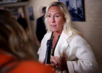 What Marjorie Taylor Greene's Investments Could Signal About Stock Market