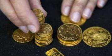 Gold steady near all-time high as Trump's tariff plans stir inflation woes