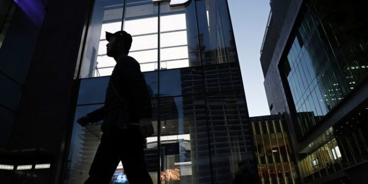 In China, whispers of change as some companies tell staff to work less