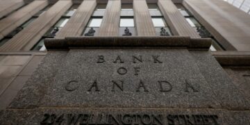 Bank of Canada holds rates, says tariffs could cause deep recession