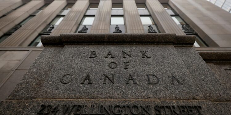 Bank of Canada holds rates, says tariffs could cause deep recession