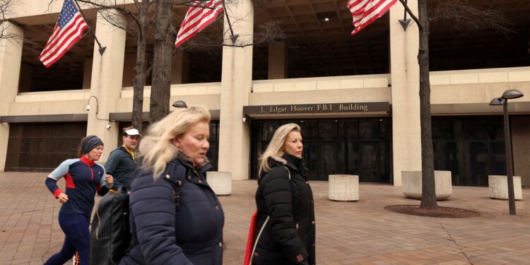 DOGE staffer advised on cuts to Justice Dept grants, document and source say