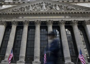 Stocks are mixed as Trump lashes out at Powell