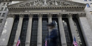 Stocks are mixed as Trump lashes out at Powell