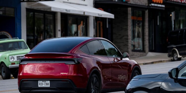 Tesla shares soar after first robotaxi rides hit the road in Austin, Texas