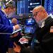 Wall Street drifts as financial markets worldwide hold relatively steady