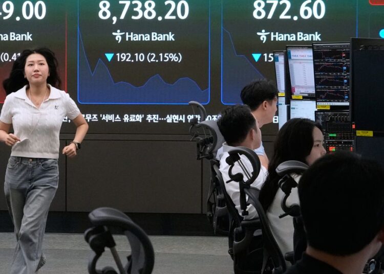 Asian shares plunge as traders sell to lock in profits after recent rallies driven by AI :: WRAL.com