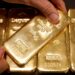 Gold slips 2% as oil rally brings Fed rate hikes into focus
