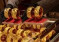 Gold holds steady as investors eye Middle East developments ahead of Fed rate decision