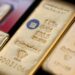 Gold holds near two-week high on easing Fed rate-hike bets