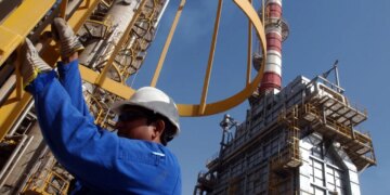 OPEC+ companies slightly boosting production as oil prices slide