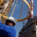 OPEC+ companies slightly boosting production as oil prices slide
