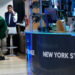Oil prices and stocks hold steadier as calm returns to financial markets worldwide