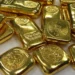 Gold Prices Ease as Markets Await Fed Minutes and Dollar Rebounds