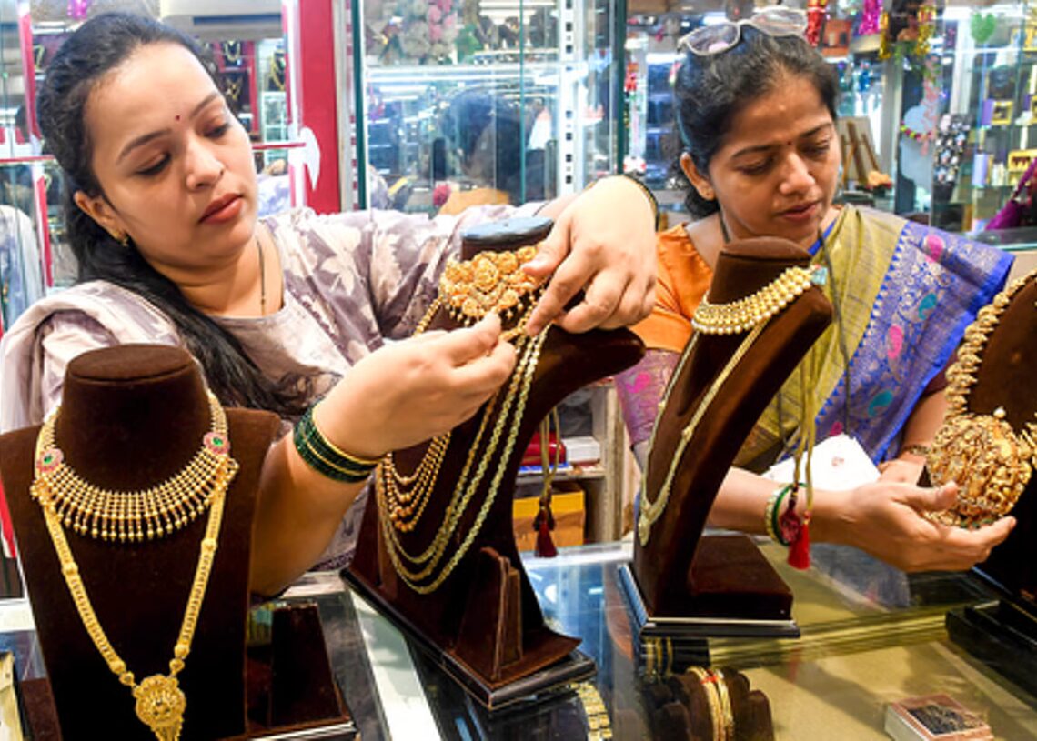 Gold slips for second straight week as stronger dollar caps safe-haven demand