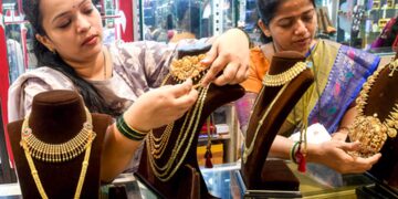 Gold slips for second straight week as stronger dollar caps safe-haven demand